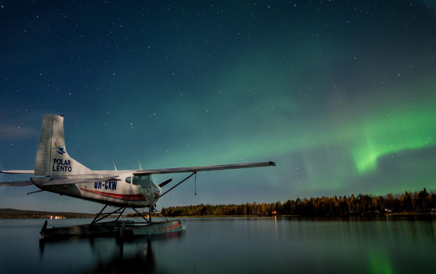 seaplane under the auroras