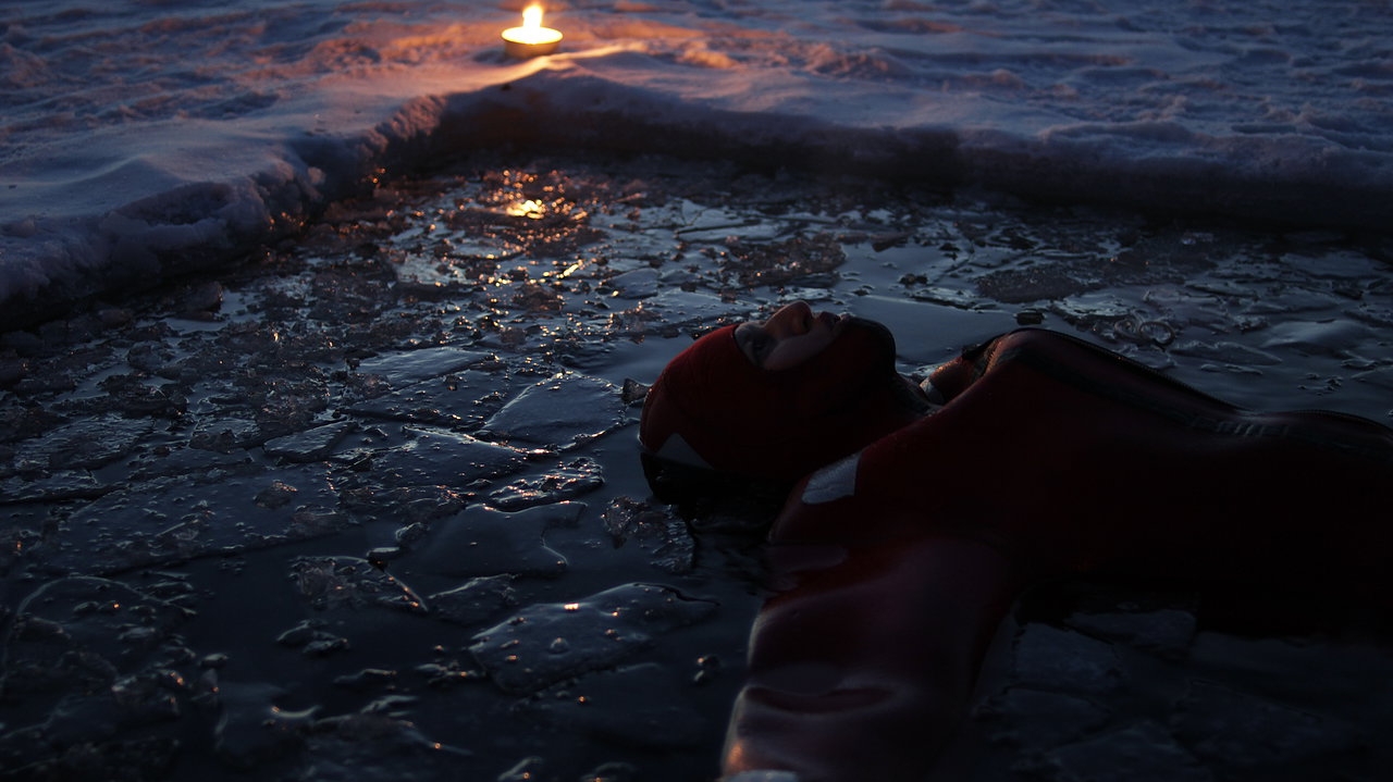 ice floating under auroras