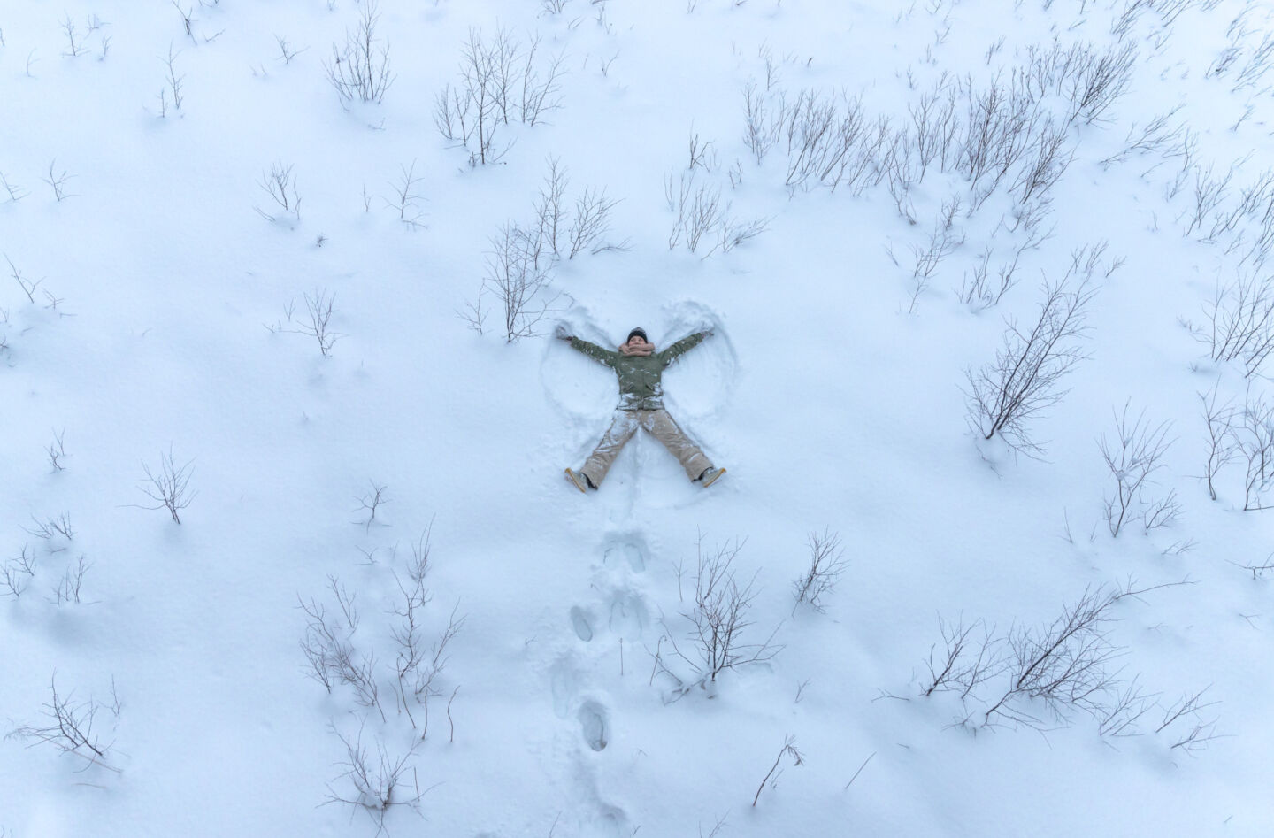 Snow angels, just one of the many ways to have fun with snow in Finnish Lapland