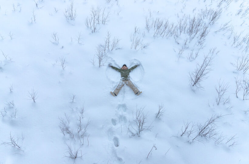 Snow angels, just one of the many ways to have fun with snow in Finnish Lapland