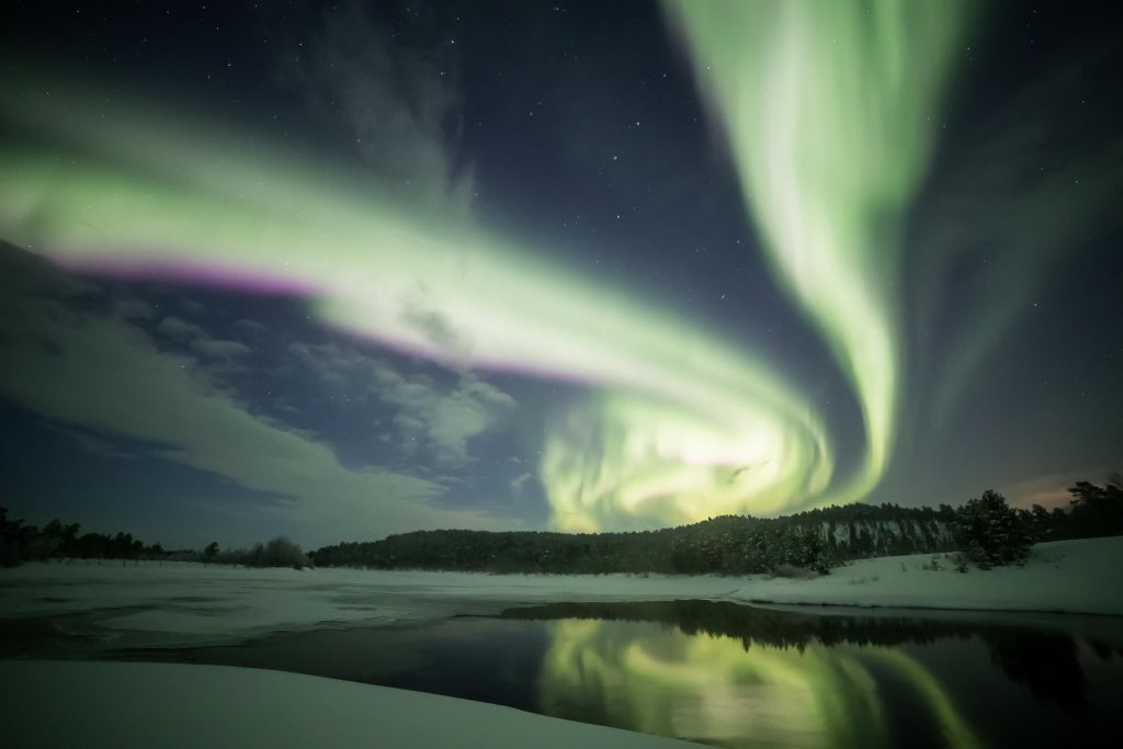 reflected auroras in Lapland