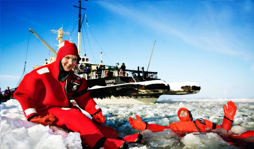 Experiencing swimming amongst the ice in Kemi Lapland.