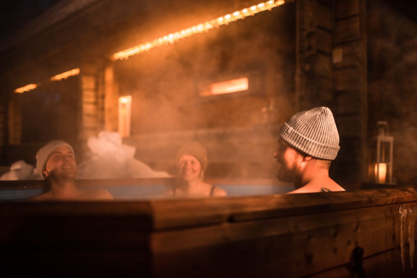 Enjoying a warm hot tub on a cold night at Sunday Morning Resort in Pyhä, Finland