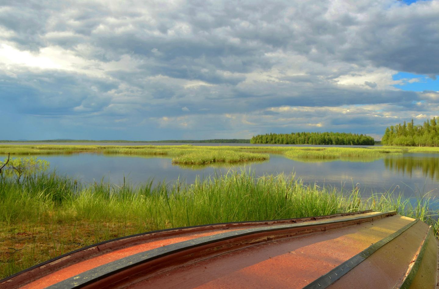 Rowboat and river in Lapland, during a fam trip in Finnish Lapland with location scout Lori Balton