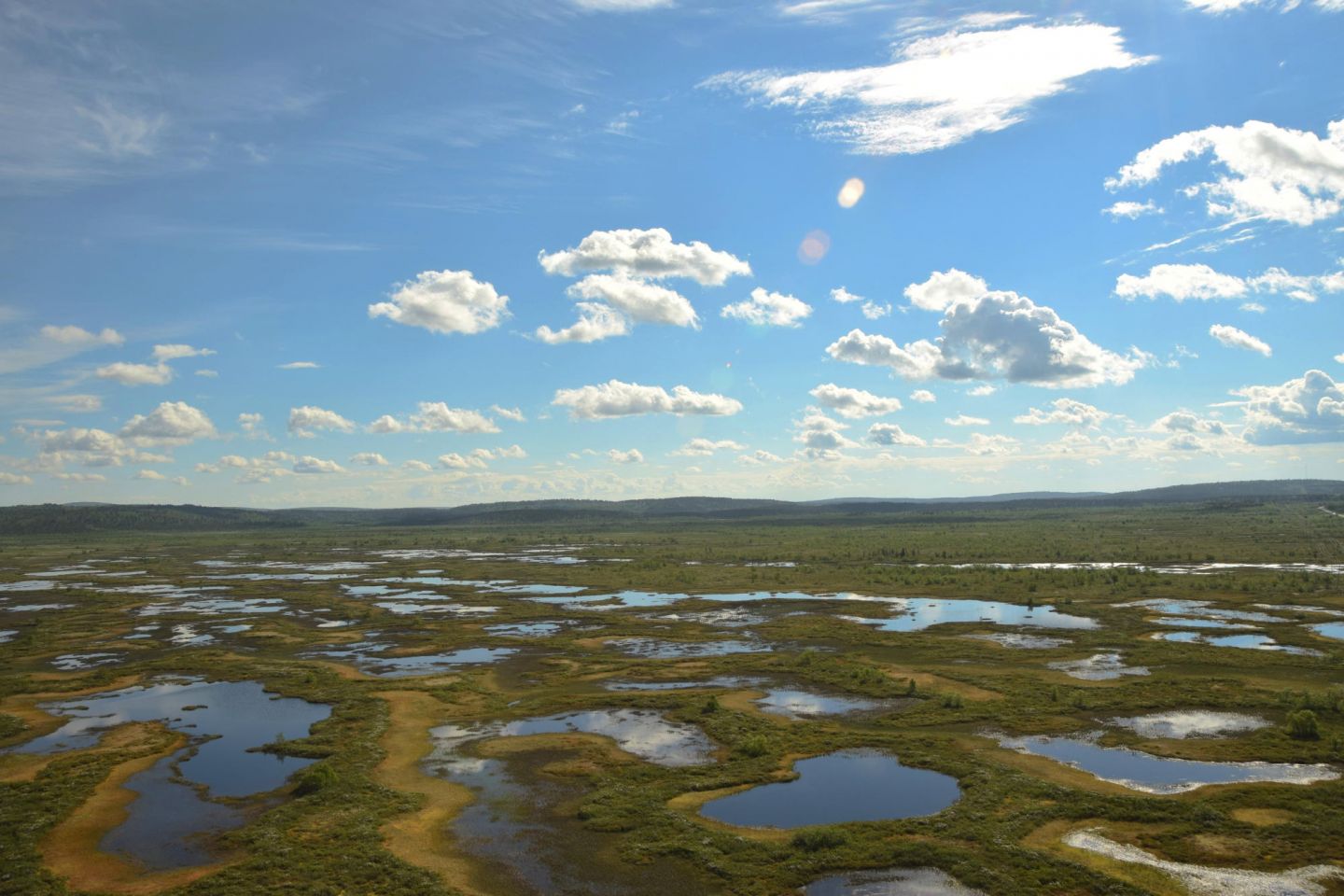 Aerial of Lapland waters and bogs, during a fam trip in Finnish Lapland with location scout Lori Balton