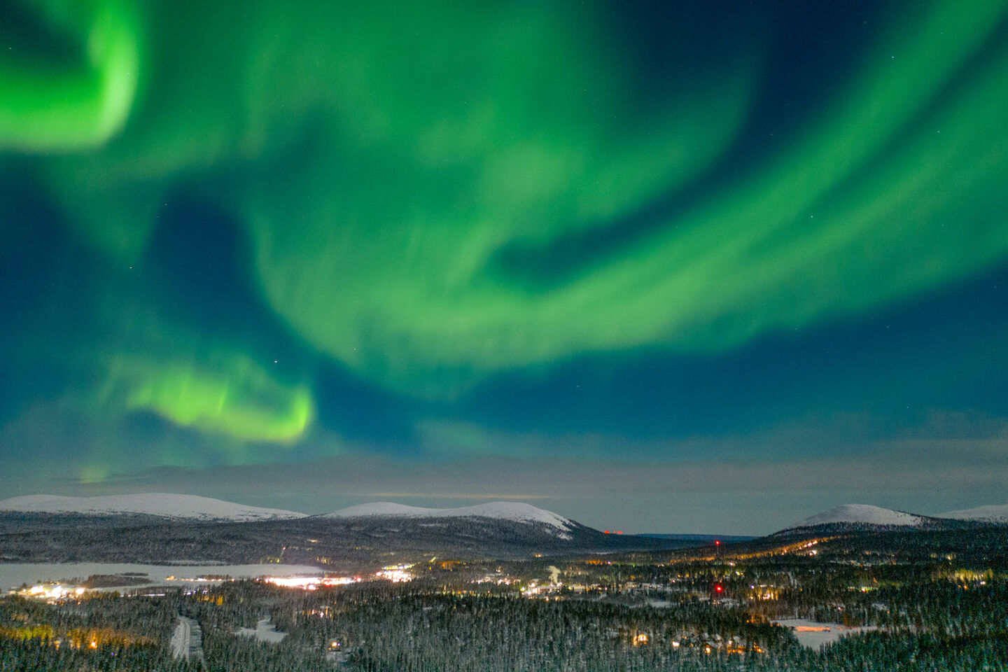 Auroras light up the sky over western Lapland