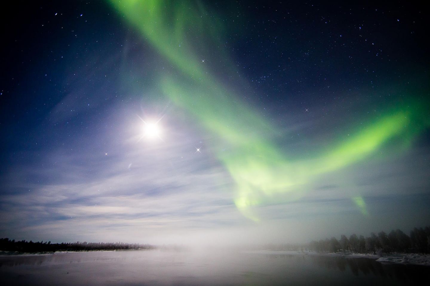 Northern Lights with the moon light in Lapland