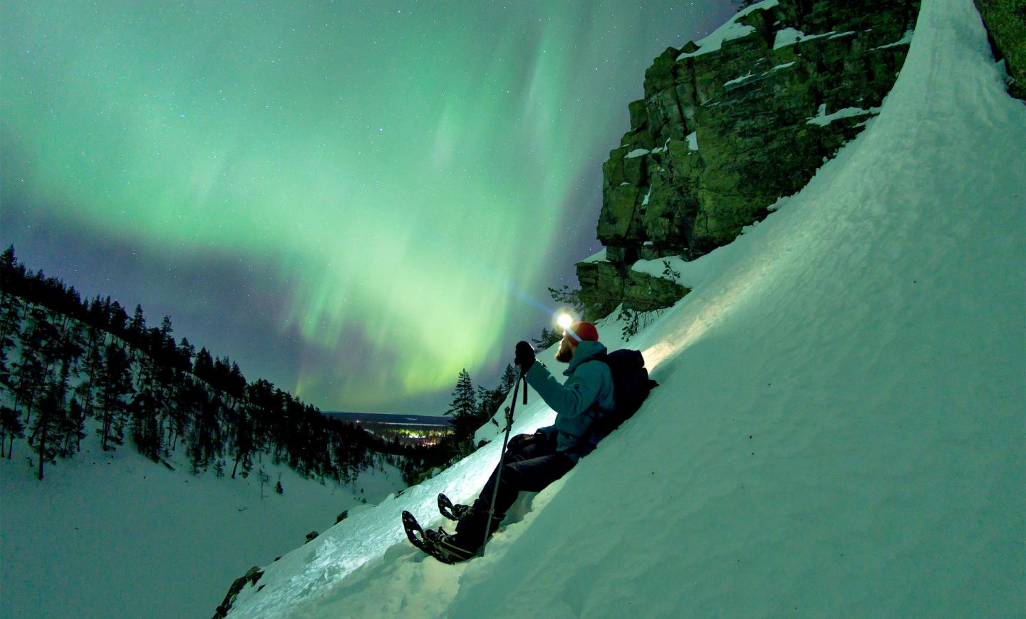 Enjoying auroras on a hill side