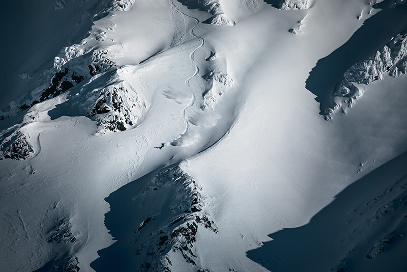 Antti Autti snowboarding in a wilderness