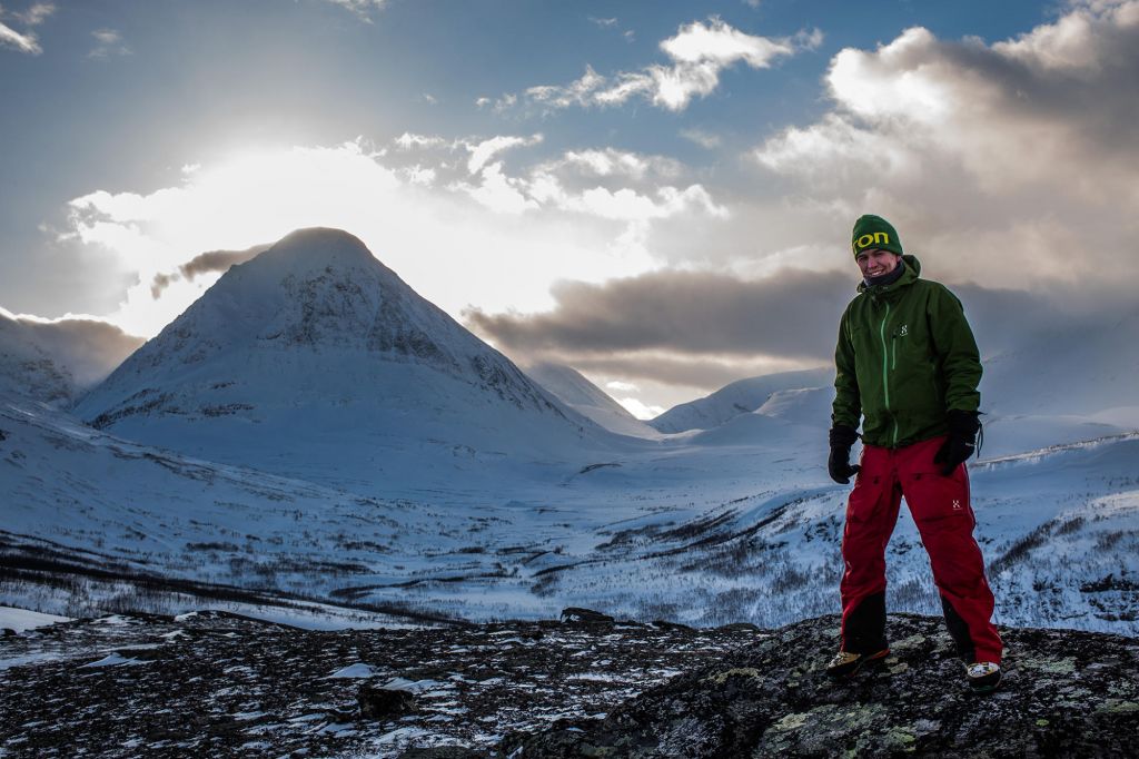 Photographer Juho Uutela against mountains in Lapland