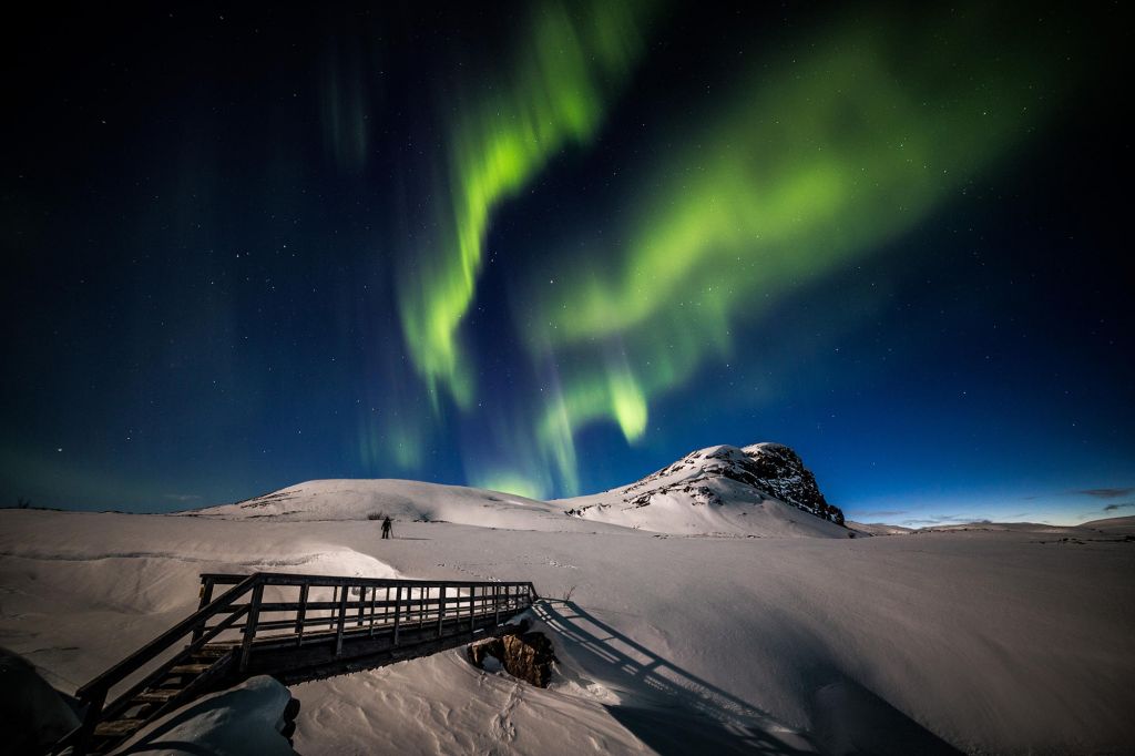 Northern Lights over Arctic landscape in winter