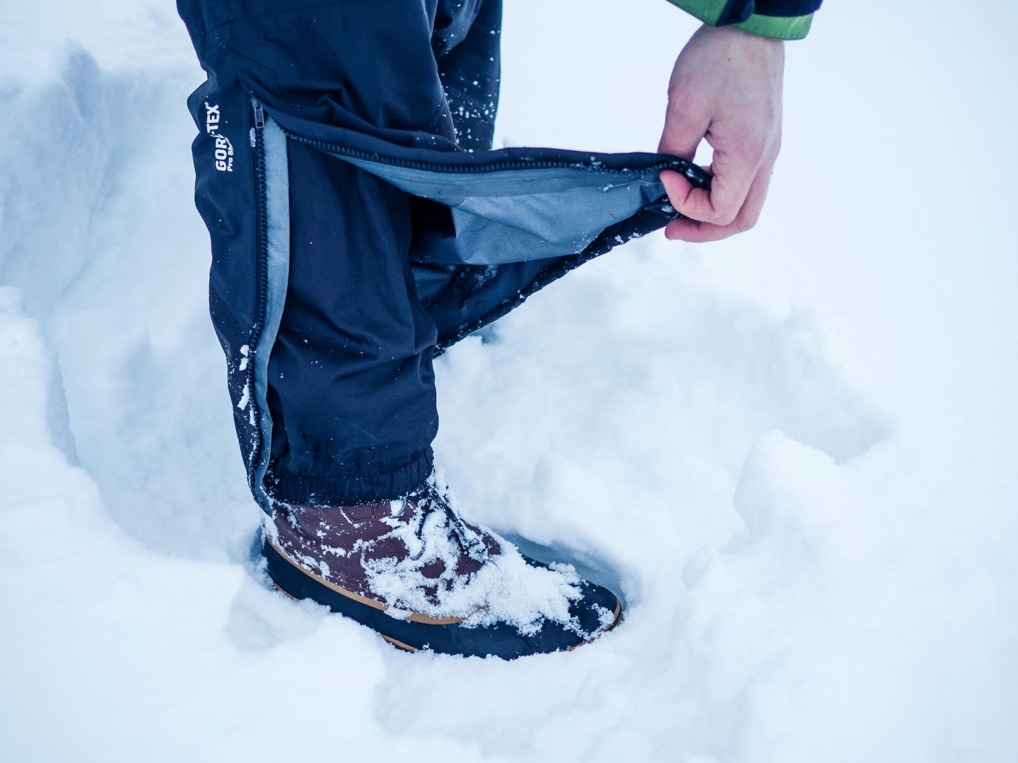 Winter pants' sleeves unzip for easy removal