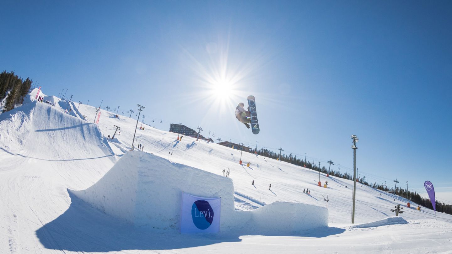 Snowboarding in Levi, Lapland under the spring sun in Finland