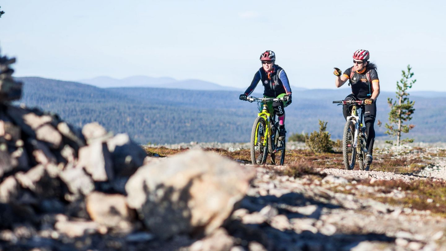 Mountain biking under the spring sun in Lapland