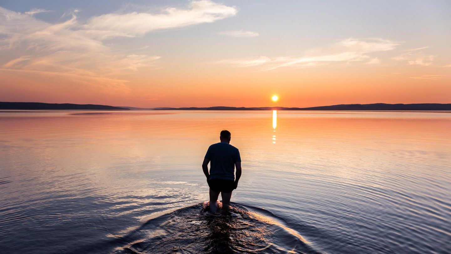 Swimming under the Lapland summer sun