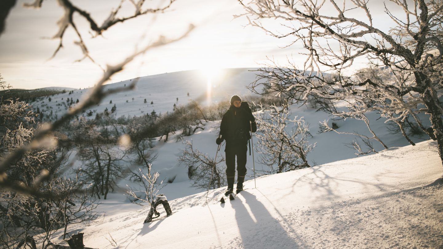 Skiing on a hill in Muonio, Finland in winter