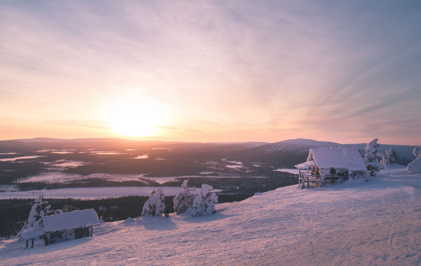 Polar night above holiday cabins in Lapland Finland