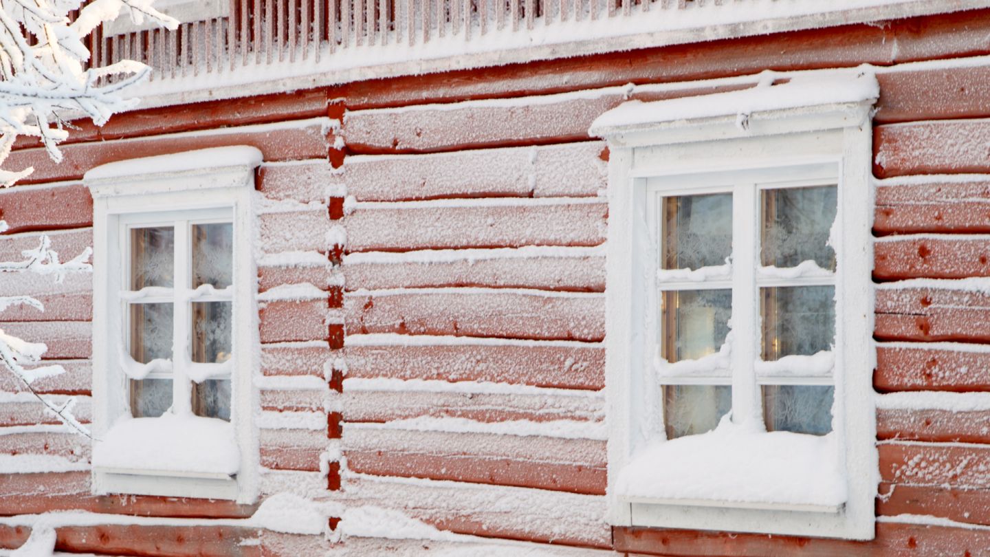 Frozen old red house