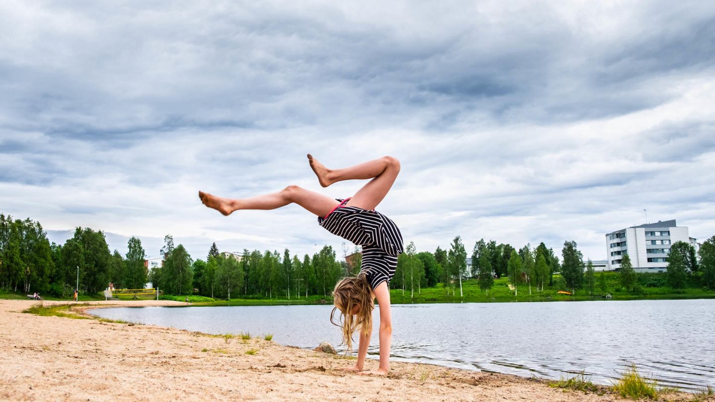 handstand on a kemijärvi beach | beaches in finland