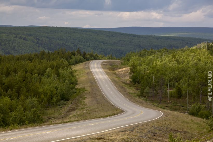 Small road through Arctic hills, in Inari, Finland