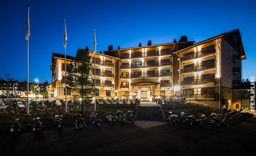 Nordic hotel in a darkening night in Inari, Lapland