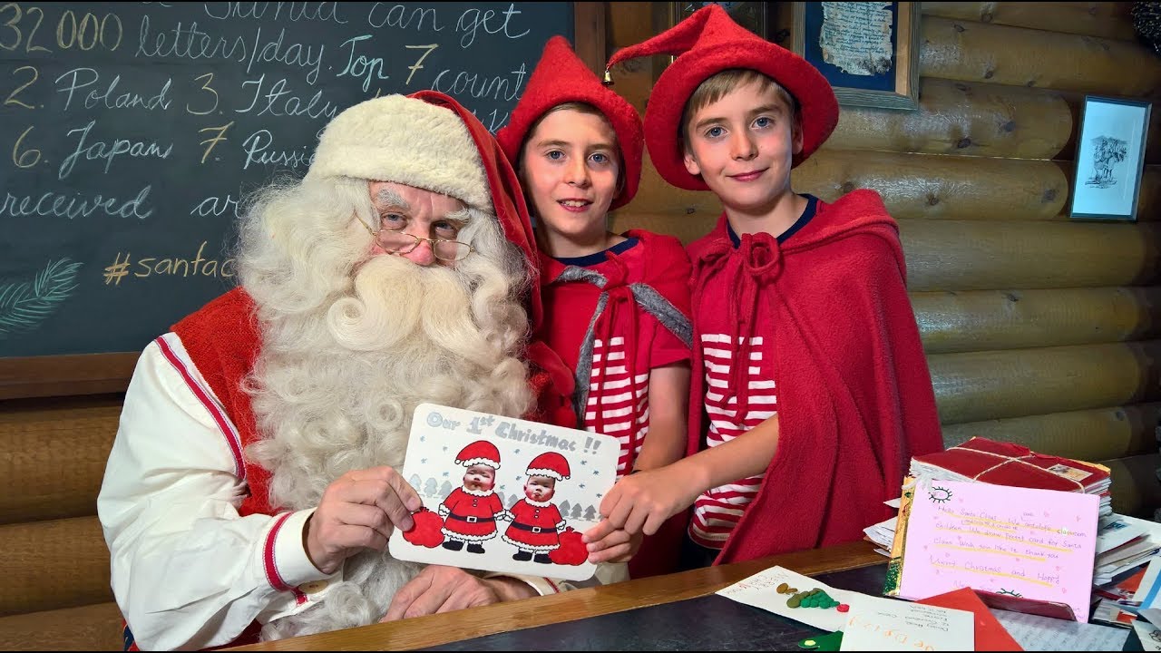 Santa Claus and his elves at the Santa Claus Main Post Office in Rovaniemi, Finland