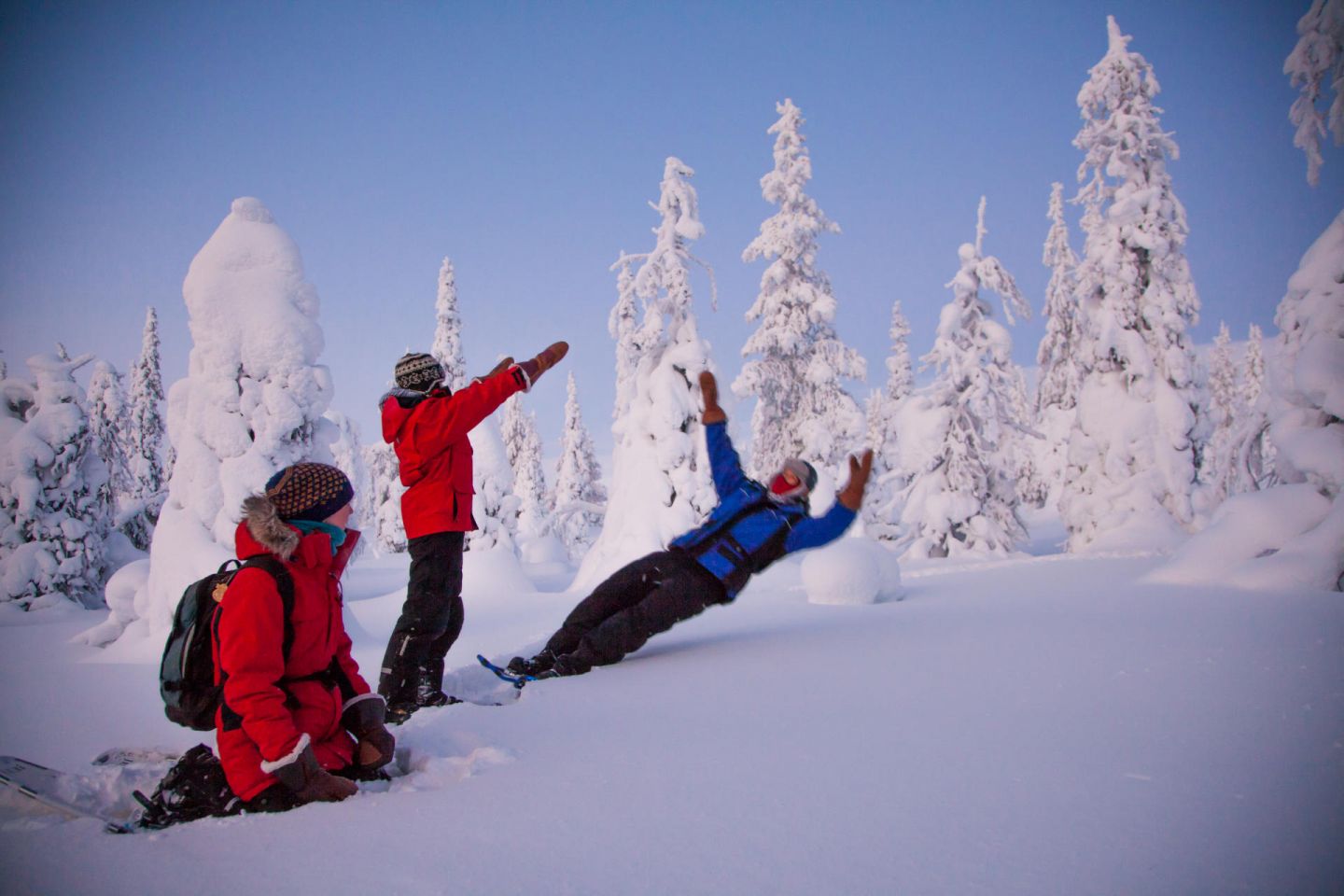 Having fun in the snow in Lapland in winter