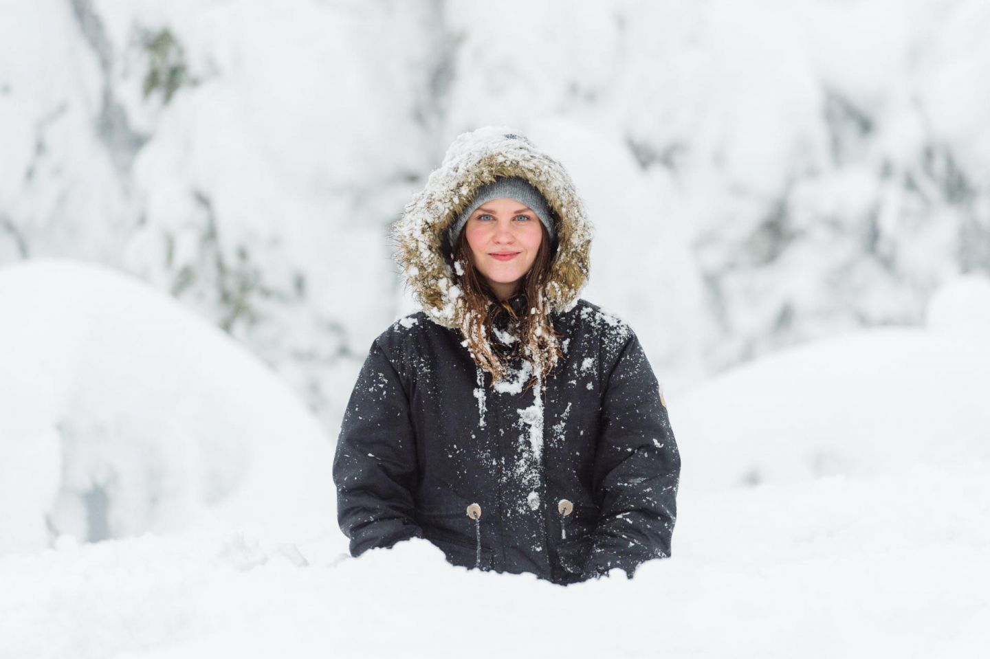 Woman in snow in Lapland in winter