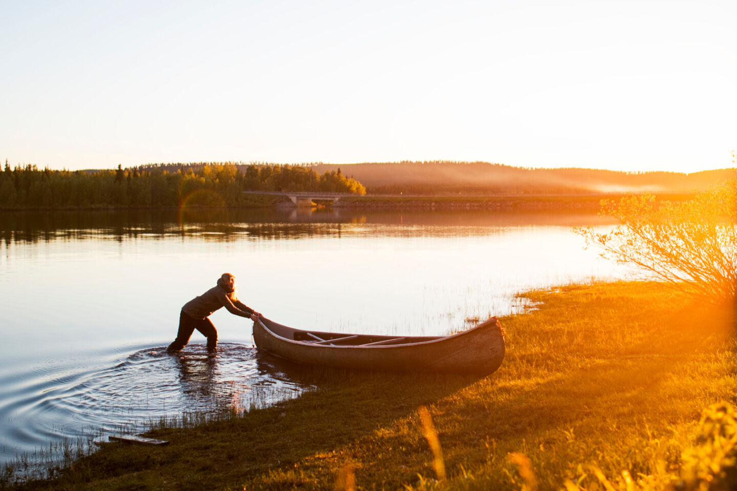 Midnight sun canoeing, a perk of seasonal work in Lapland