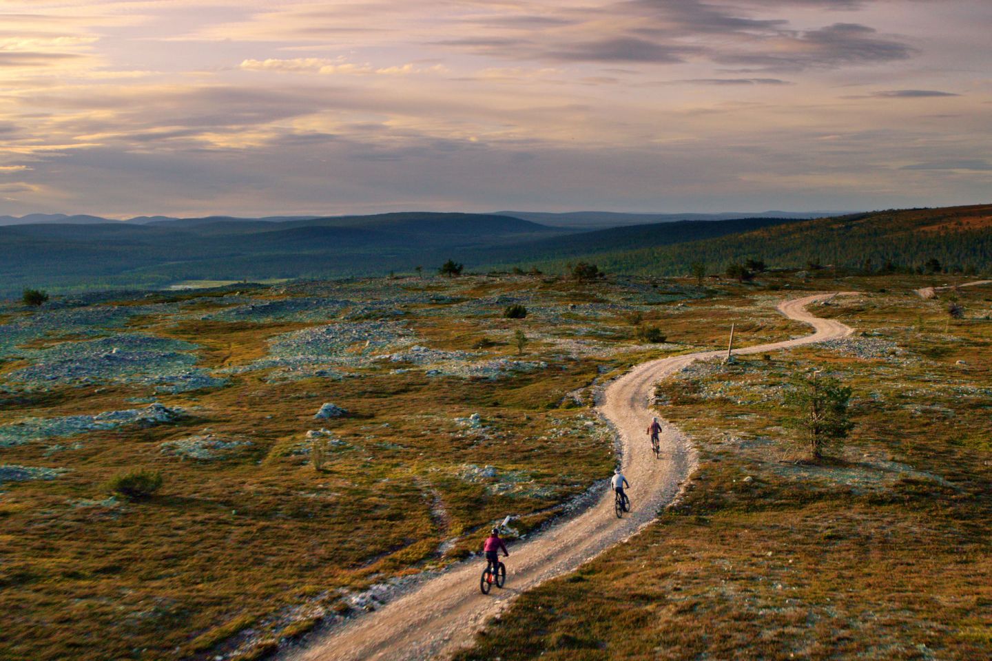 Mountain bike riding under the Midnight Sun in Finnish Lapland