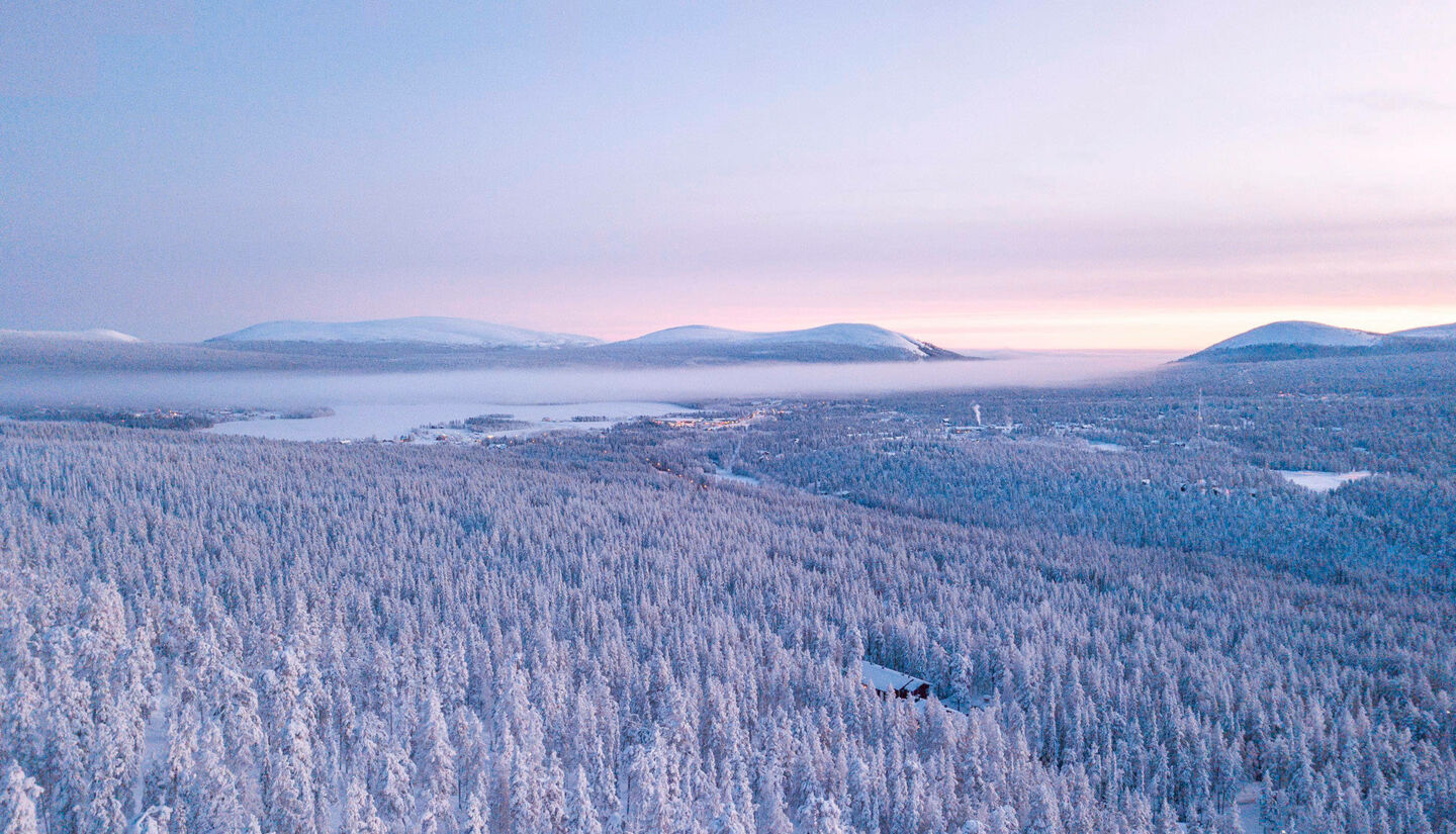 Polar night over a snowy landscape in Finnish Lapland