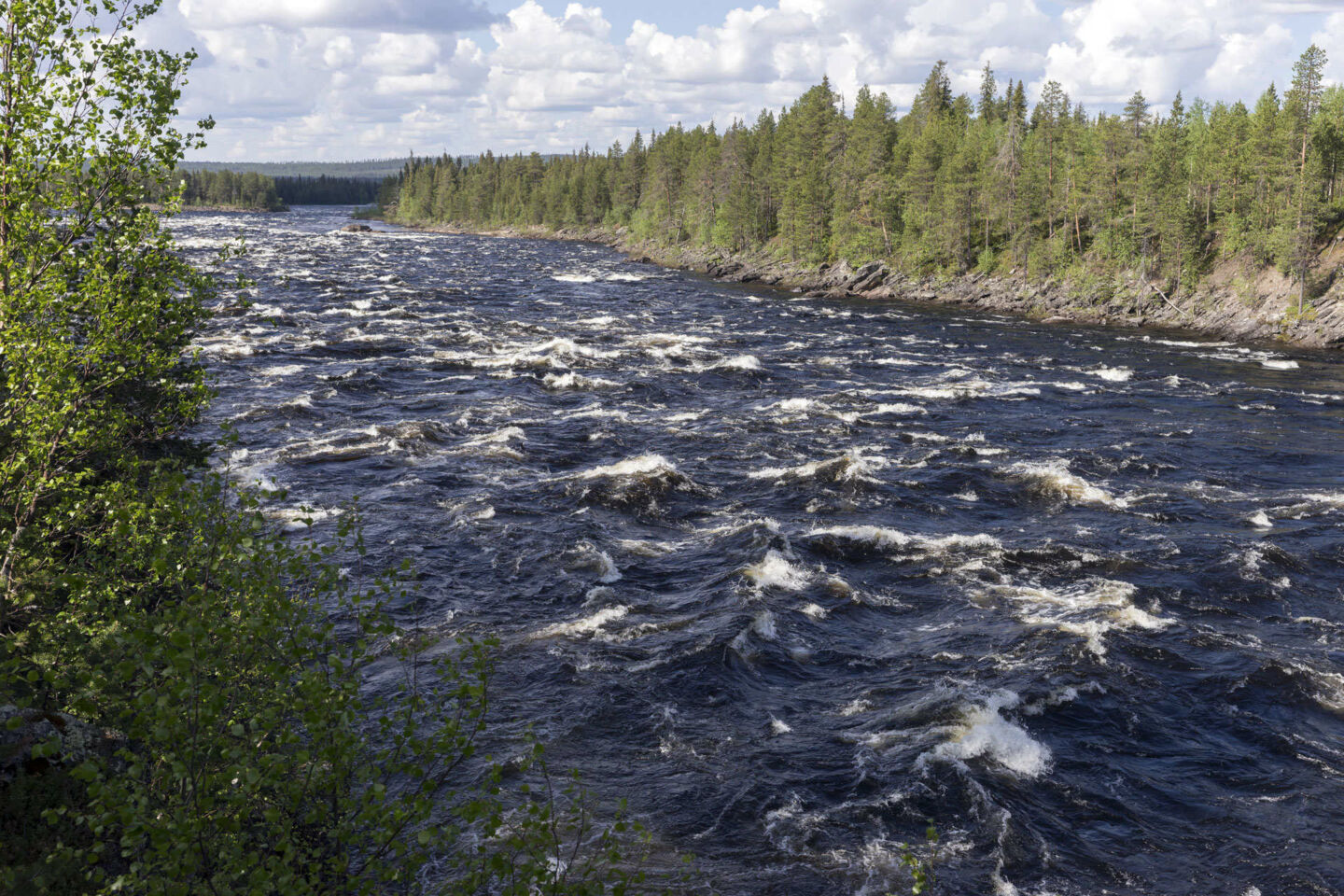 Summer scene atAijakoski rapids in Muonio, a Finnish Lapland filming location