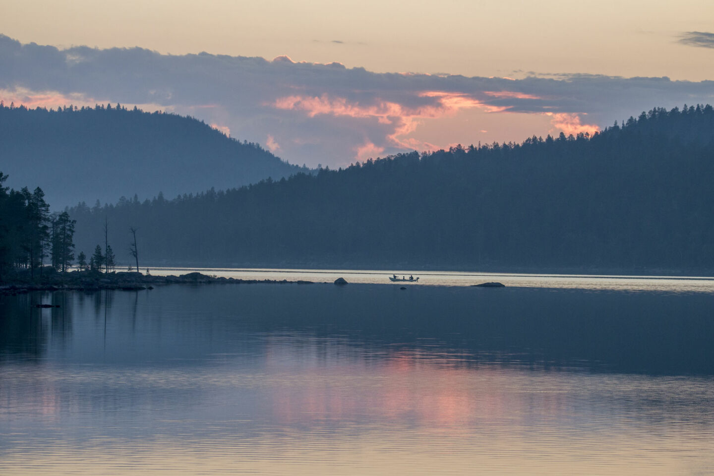 The colors of sunset at Lake Inari in summer, a filming location in Finnish Lapland