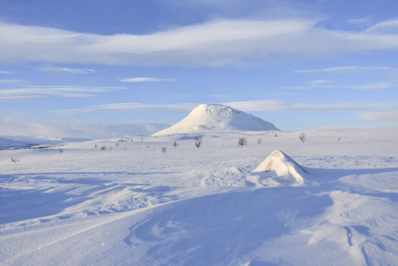 A snowy vista of Mt. Saana, an Arctic fell in Kilpisjärvi, a Finnish Lapland filming location