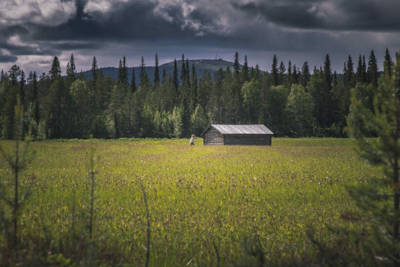 A log building in the fields of Salla, a Finnish Lapland filming location