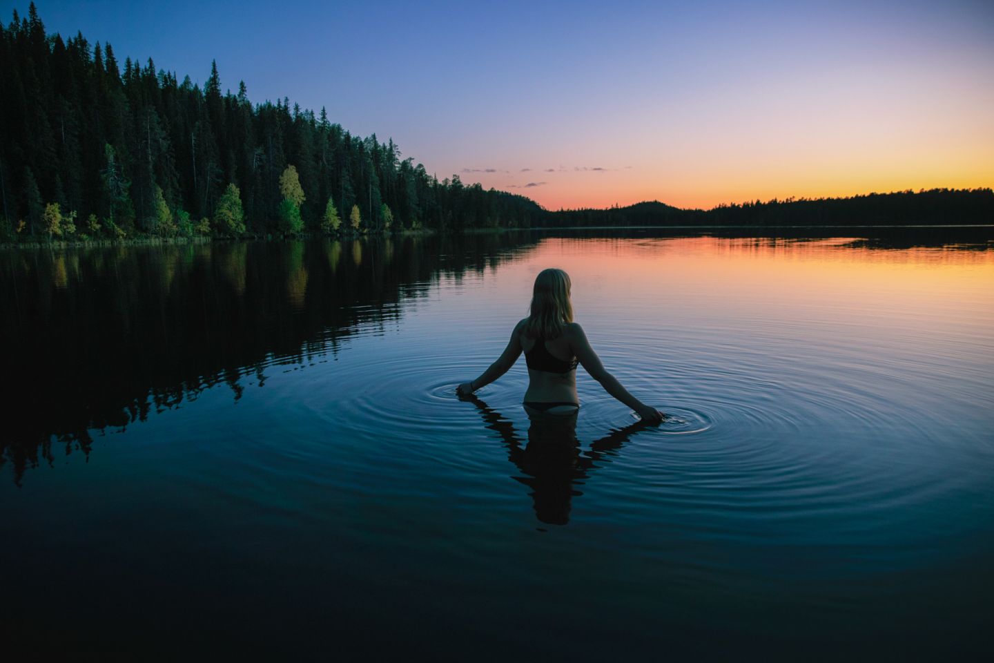 Enjoying an evening swim in Ruka-Kuusamo