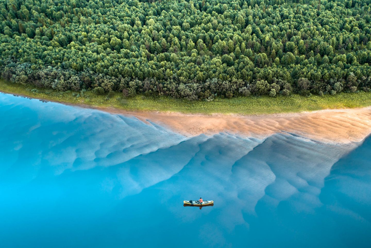 Canoeing near the beach in Finnish Lapland