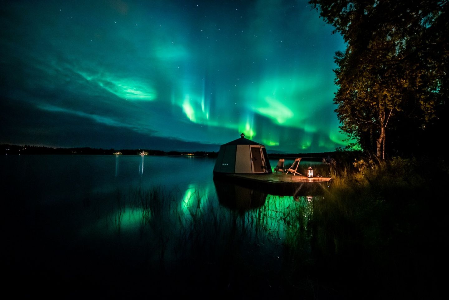 The auroras over a floating igloo in Ranua, Finland