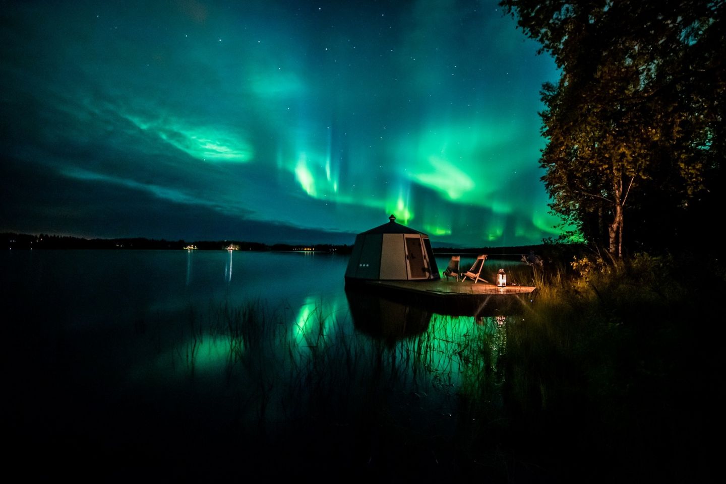 The auroras over a floating igloo in Ranua, Finland