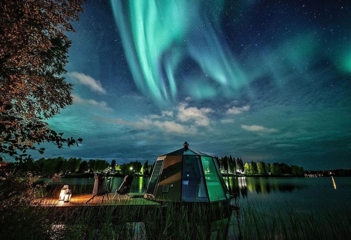 Northern Lights over floating igloos in Ranua, Finland