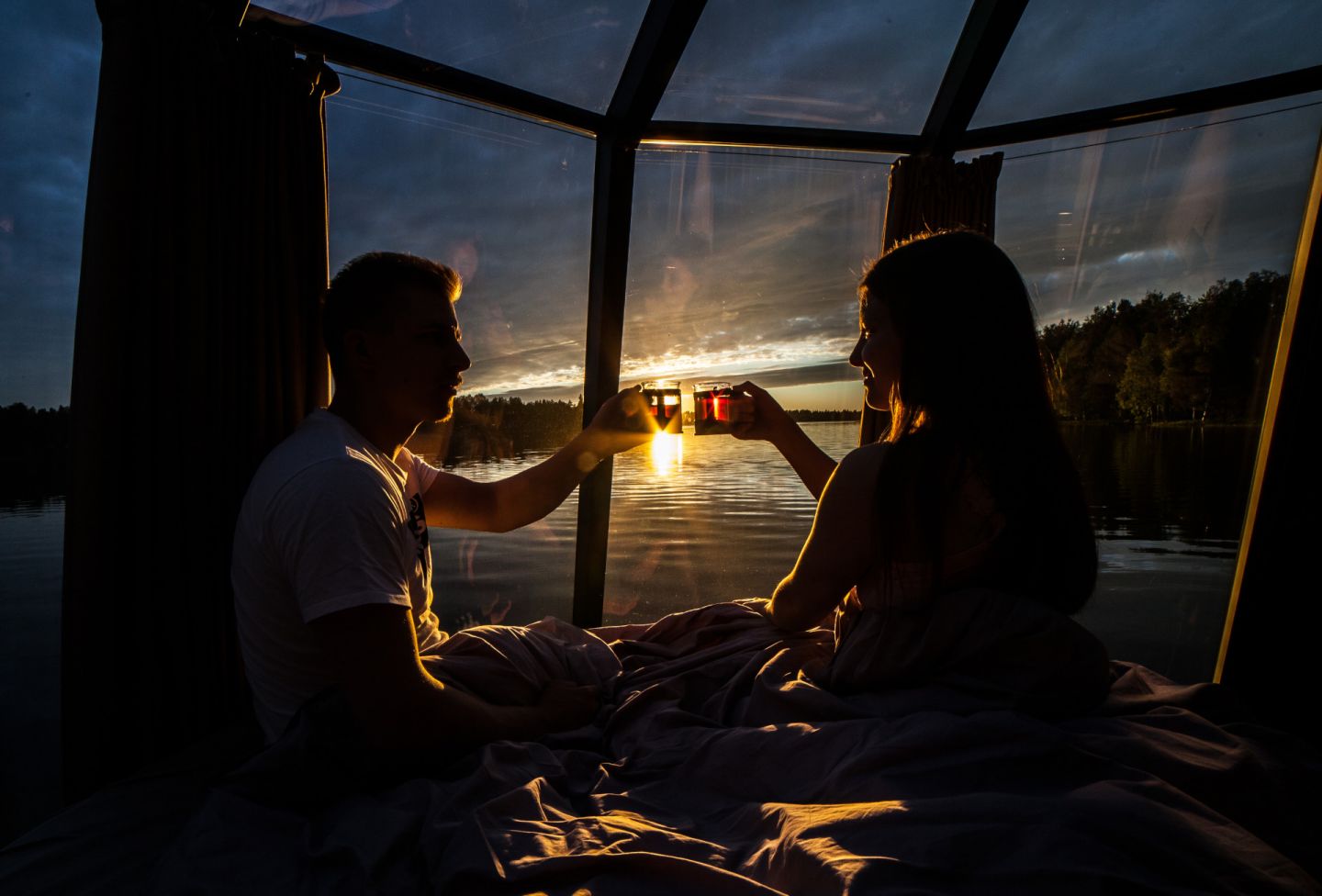 Enjoying the sunset in a floating igloo in Ranua, Finland