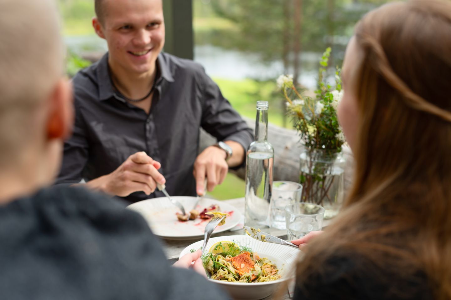 Enjoying a meal in Salla, Finland in summer