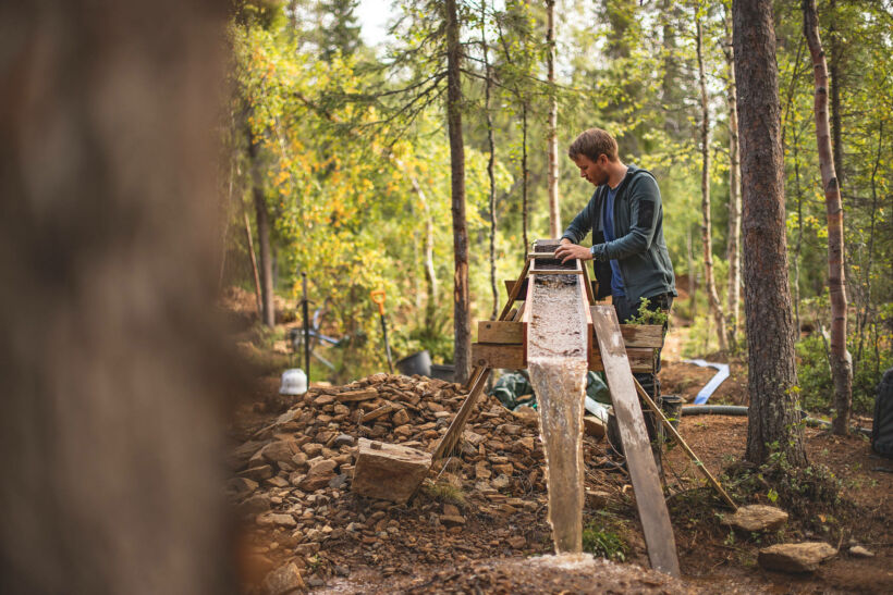 Panning for gold at Tankavaara Gold Village in Sodankylä, a Finnish Lapland filming location