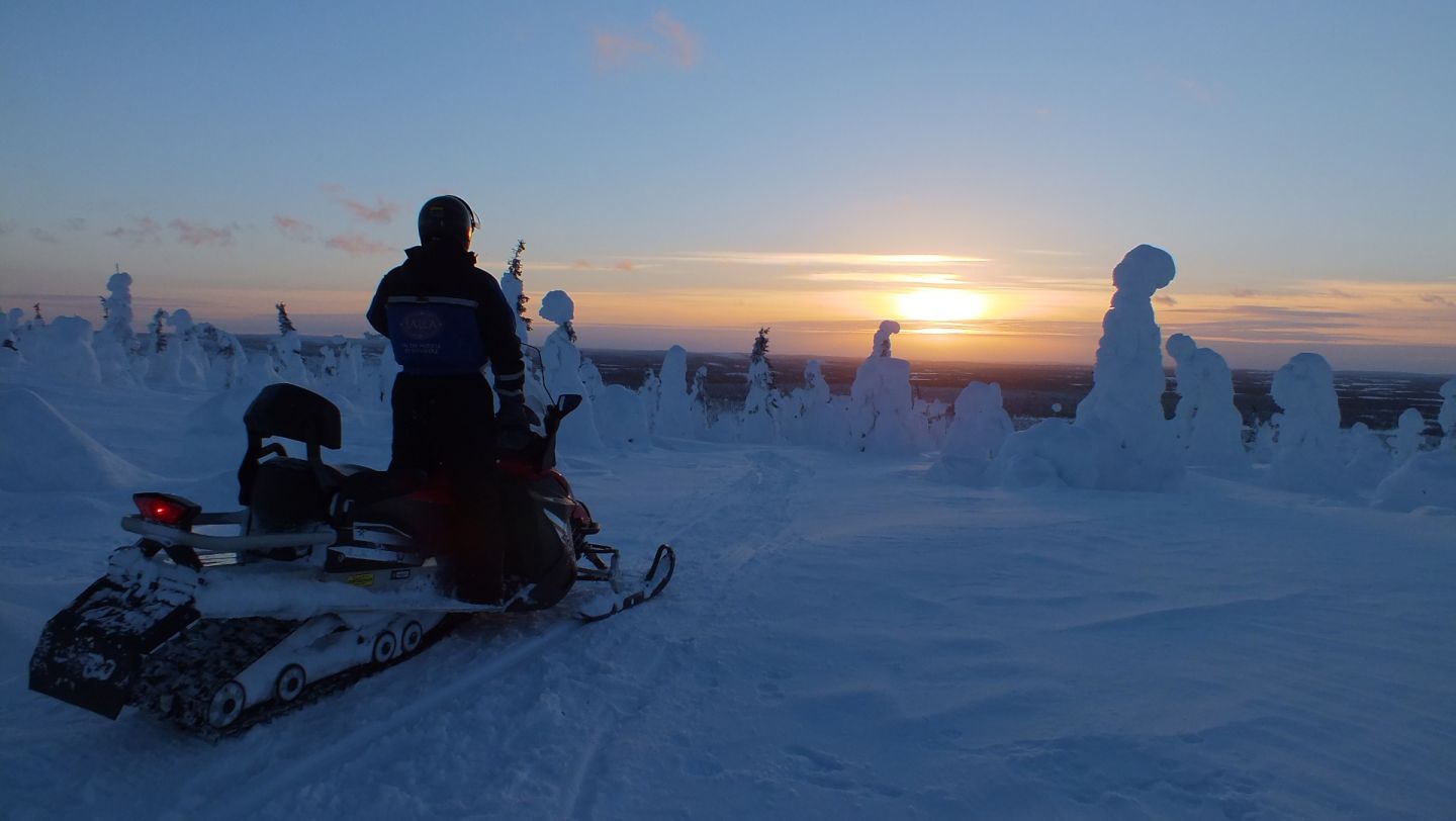 Snowmobiling in Salla, Finland in winter