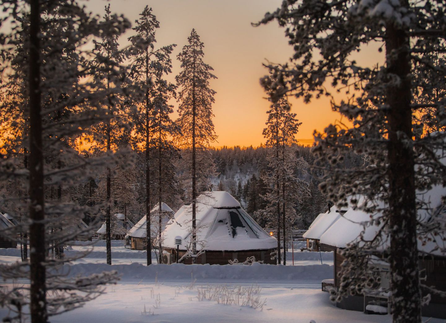 Sunset at Northern Lights Village, a special winter accommodation in Saariselkä, Finland