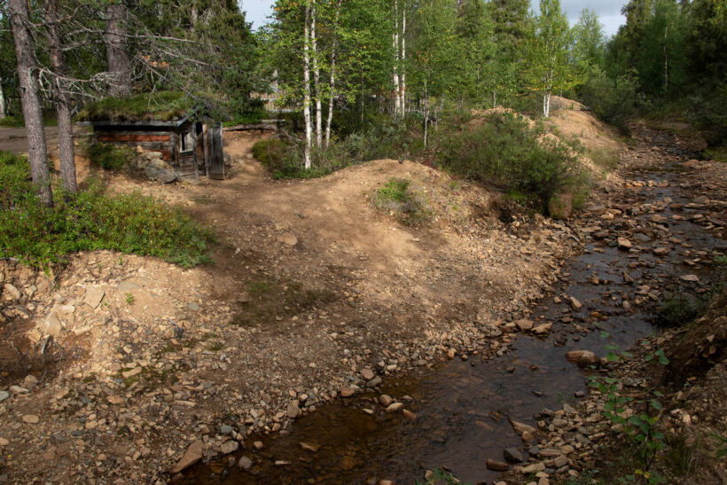 A flowing stream at Tankavaara Gold Village in Sodankylä, a Finnish Lapland filming location