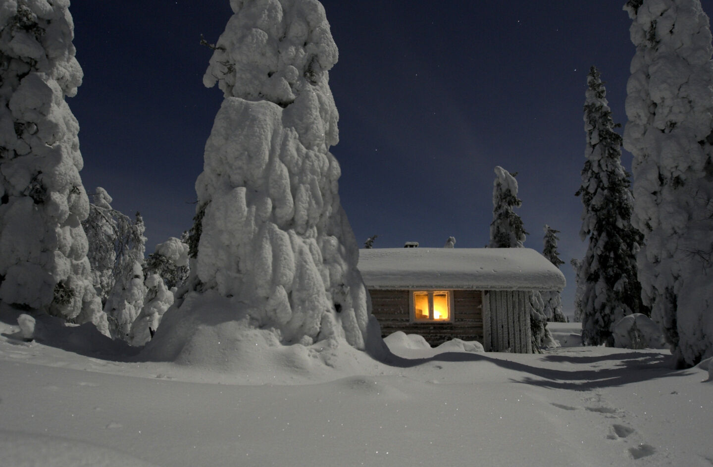 Log cabin in winter in Posio, Finland