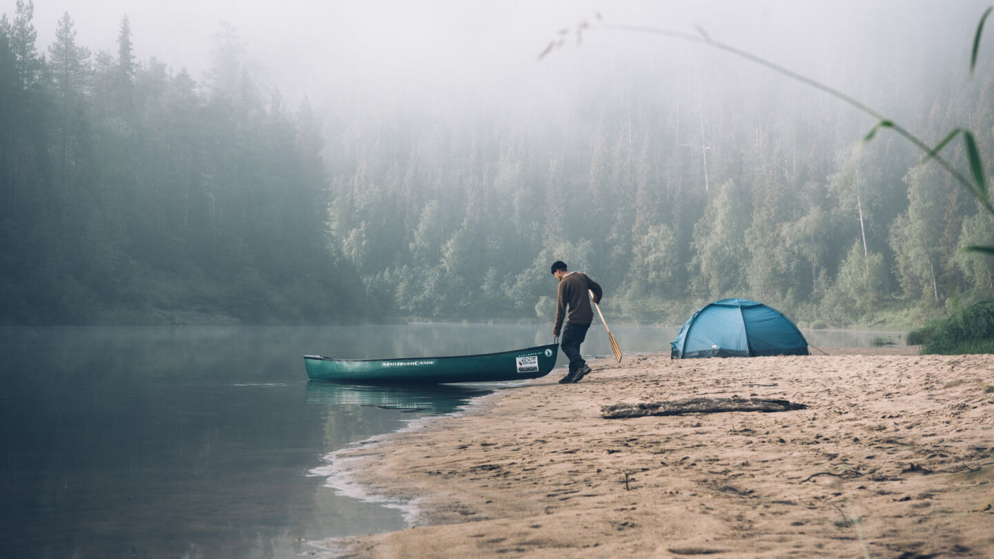 Canoeing in autumn in Ruka-Kuusamo, Finland