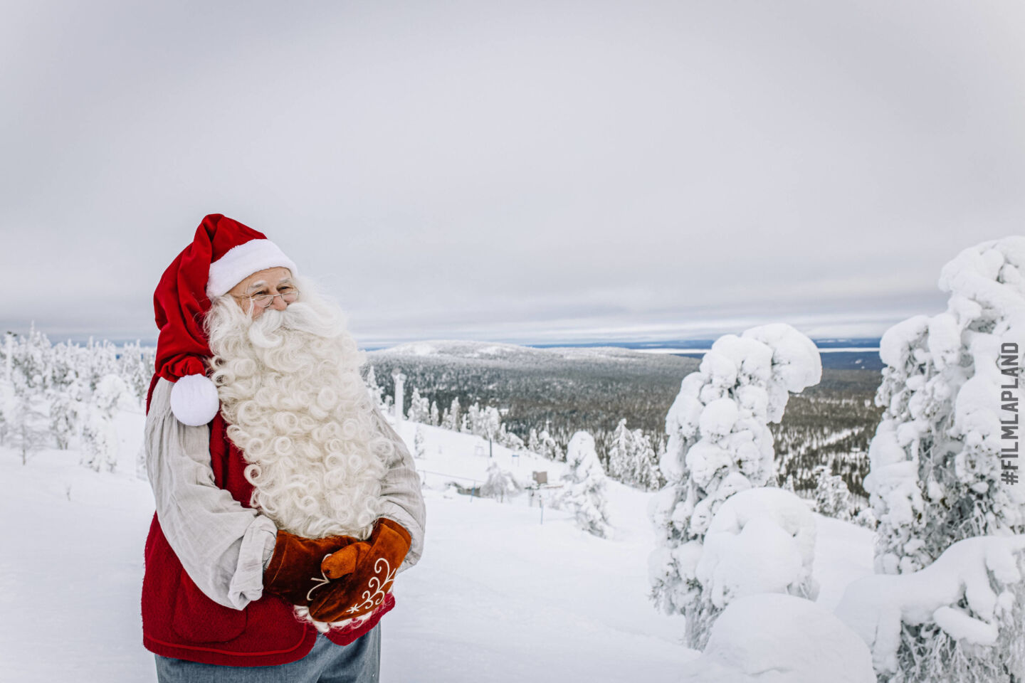 Santa Claus surveys Finnish Lapland on a winter day