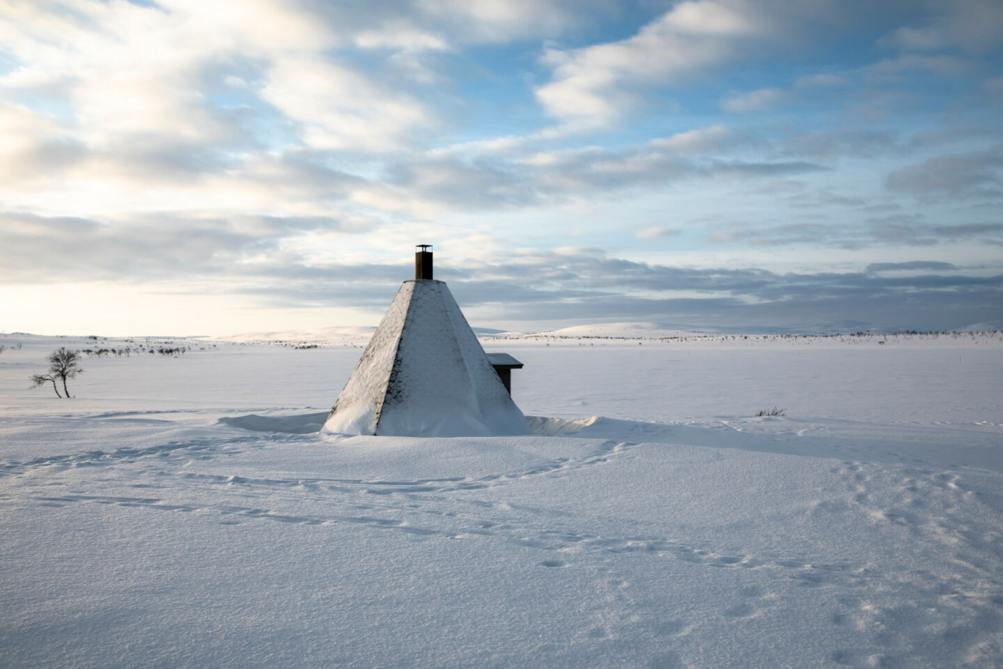 A lone kota in the tundra wilderness in Utsjoki, Finland
